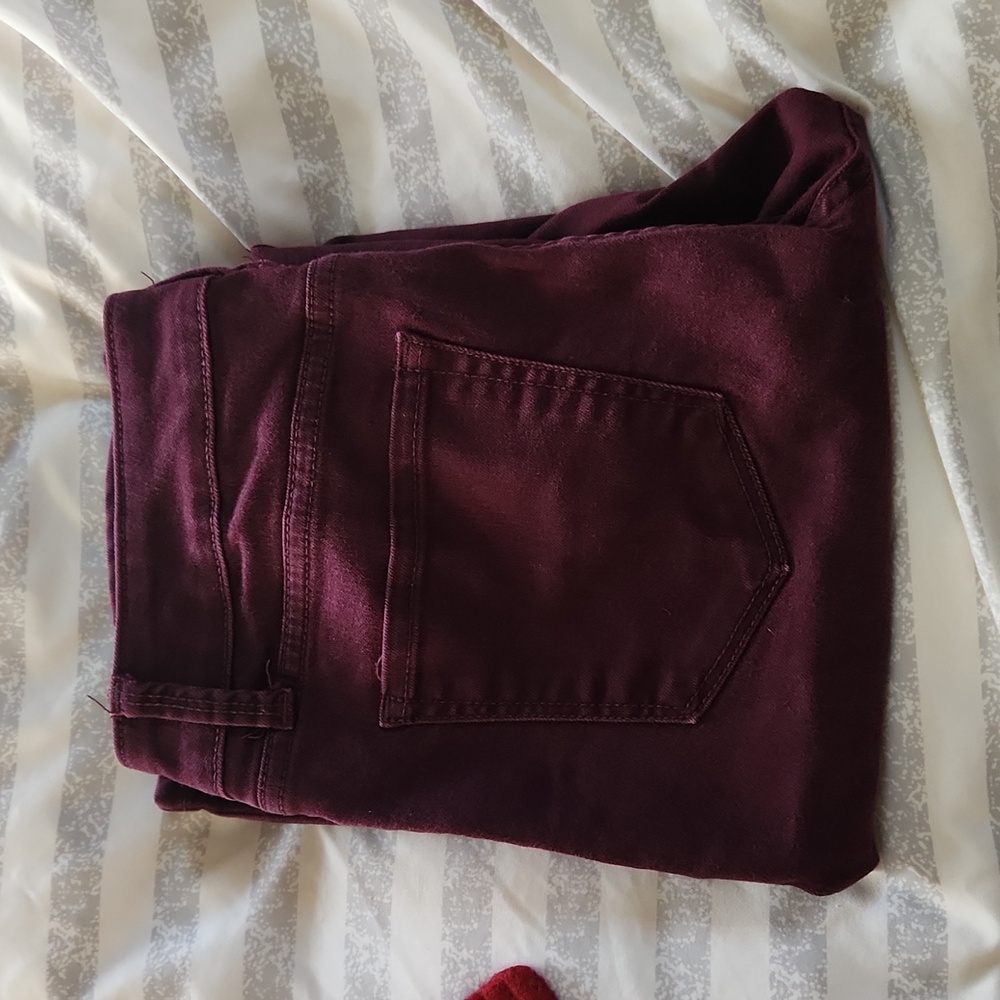 Wine colored skinny jeans
